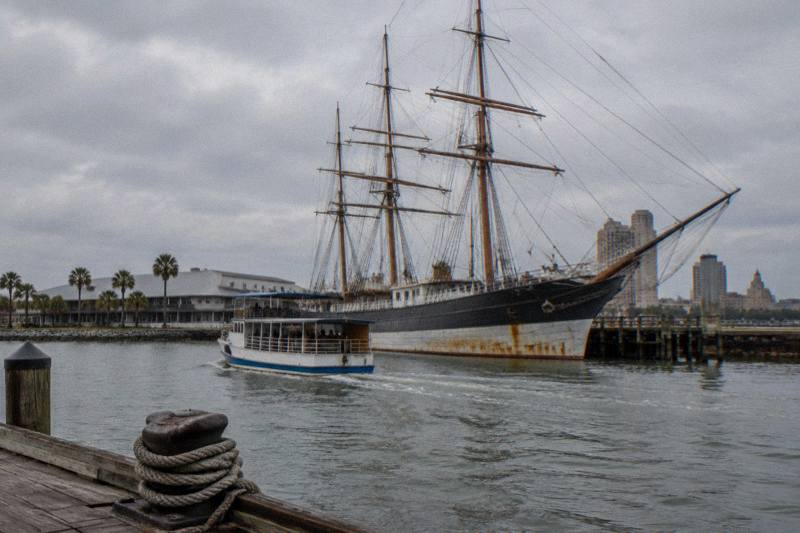 Harbor history cruise passing the Galveston waterfront